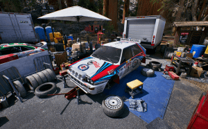 Lancia Delta HF Intégrale sur cric et un joyeux bazar autour... Néanmoins, des images très fines et détaillées.